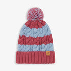 A pink and blue knitted Striped Cable Bobble Hat Pink with a pompom, and a 'muddy puddles' tag on the brim.